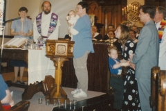 46-2-Jim-02-1997-May-jane-baptising-and-Michael-Lapsley-b